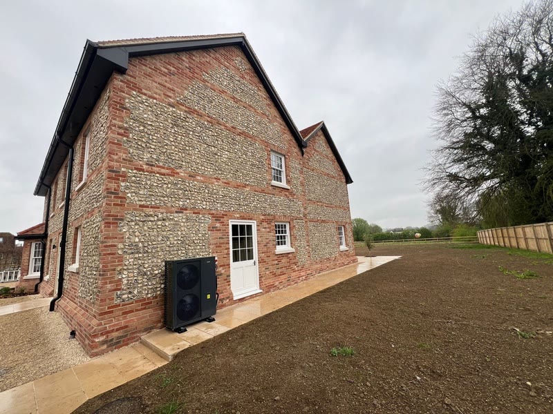 A traditional brick country house valued at £2.7M, finished exterior