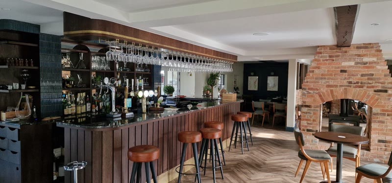 Olivier at The Chequers — finished bar interior with exposed beams