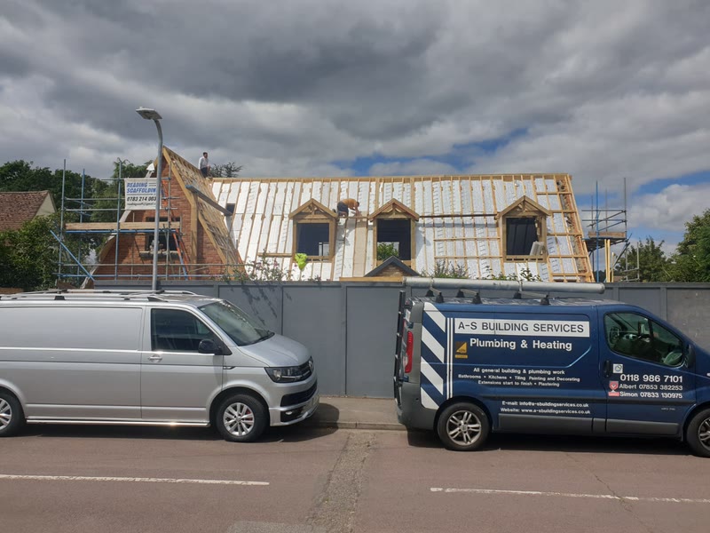 A-S Building Services van parked at the residence