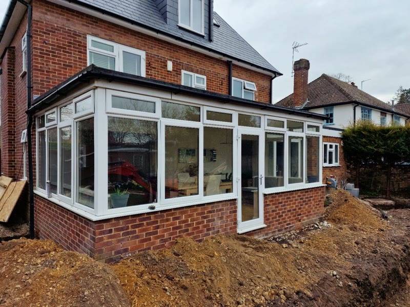Modern rear orangery extension on a red-brick semi-detached house in Berkshire