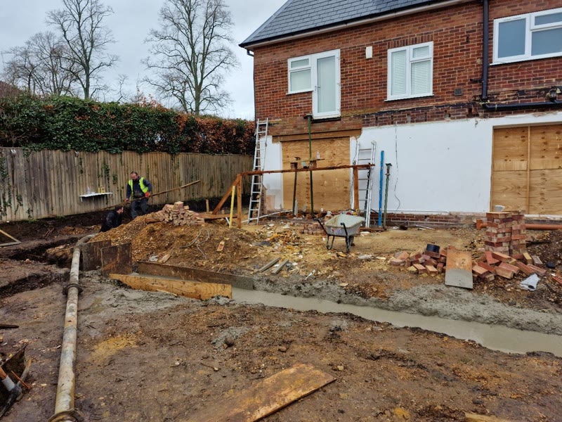 Foundations and brick wall under construction